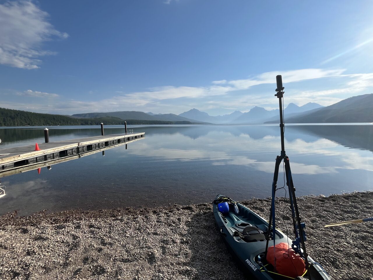 Lake McDonald and McDonald Creek in Glacier National Park, photographed from the water in July 2026