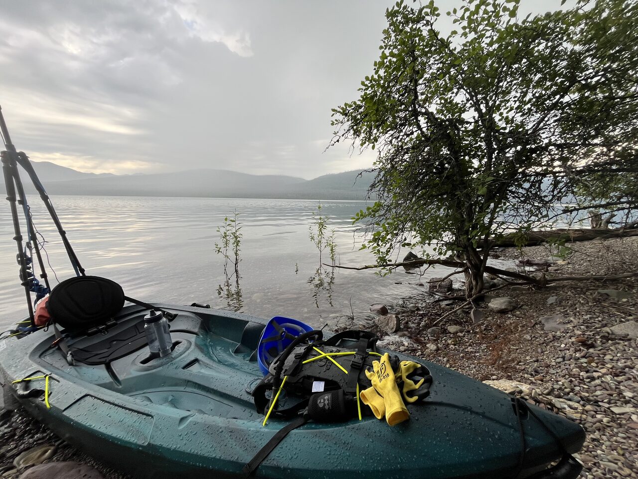 Lake McDonald and McDonald Creek in Glacier National Park, photographed from the water in July 2026