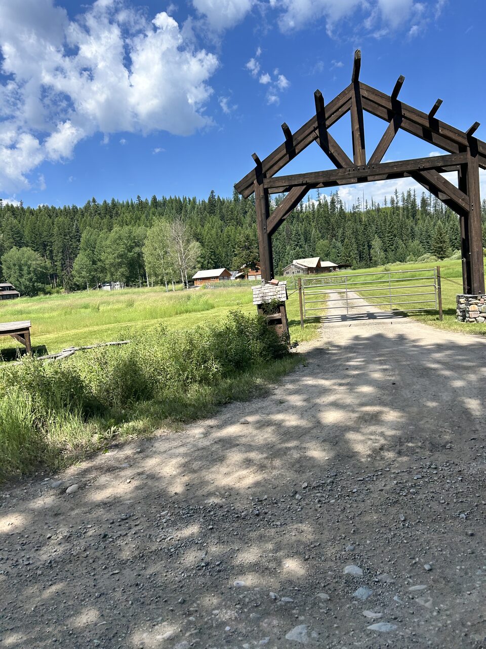 A ranch gateway on the North Fork Road. Most of the drive up the fork looks like this: gravel, and slower than the mileage suggests.